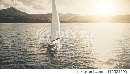 Slow motion sun reflection at yacht on ocean bay aerial. Sailing regatta race on boat at sunshine Slow motion sun reflection at yacht on ocean bay aerial. Sailing regatta race on boat at sunshine 113523593