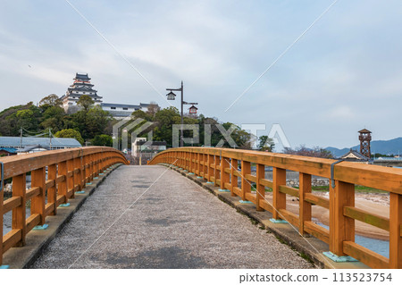 Karatsu castle from Jyounai bridge in city at sunset, Saga, Japan Karatsu castle from Jyounai bridge in city at sunset, Saga, Japan 113523754