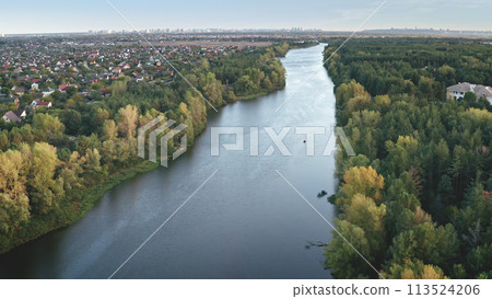 Closeup green forest at river aerial. Nobody nature landscape. Cityscape at leaf tree. Greenery park 113524206