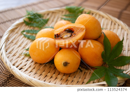 Loquats on a basket 113524374