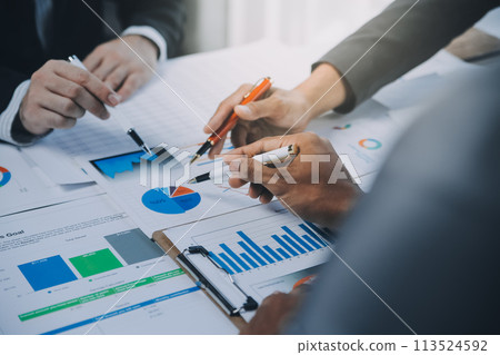 Business idea. Business people talking And calculations about charts and graphs showing the growth of investment results Of successful teamwork 113524592