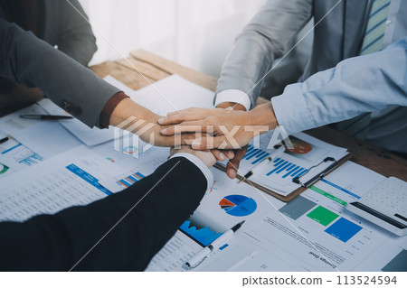 Business people accept or confirm project on the proposal and join shaking hands at office. Business people accept or confirm project on the proposal and join shaking hands at office. 113524594