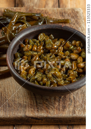 Chilean Australin peruvian seaweed COCHAYUYO. Choped cooked cochayuyo in bowl Chilean Australin peruvian seaweed COCHAYUYO. Choped cooked cochayuyo in bowl 113525333