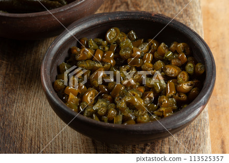 Chilean Australin peruvian seaweed COCHAYUYO. Choped cooked cochayuyo in bowl 113525357