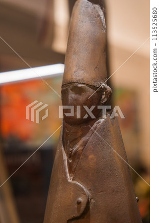 Close up sculpture resembling human figure with blurred background, unknown location. Perfect for art lovers seeking elegant decor inspiration in Rome. Close up sculpture resembling human figure with blurred background, unknown location. Perfect for art lovers seeking elegant decor inspiration in Rome. 113525680