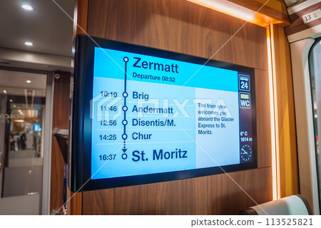 Luxury train info screen in Switzerland. Departure info, crew message, services icons, current temp 6degC , altitude 1614m , clock. Modern interior. Luxury train info screen in Switzerland. Departure info, crew message, services icons, current temp 6degC , altitude 1614m , clock. Modern interior. 113525821