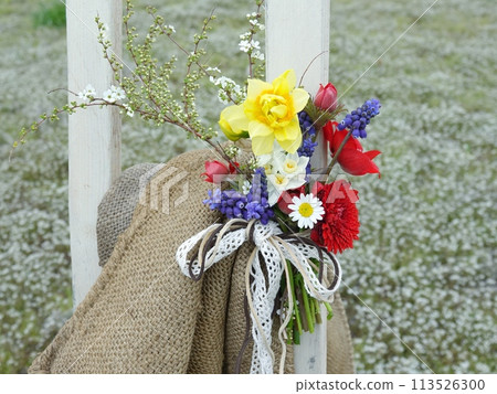 Bouquet on an easel 113526300