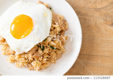 fried rice with pork and fried egg in Japanese style fried rice with pork and fried egg in Japanese style 113526697
