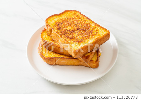 french toast on white plate 113526778