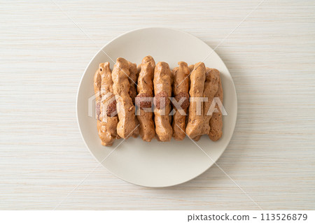 chocolate meringue stick on plate chocolate meringue stick on plate 113526879