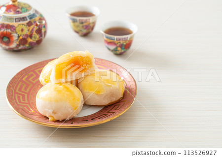Chinese pastry moon cake with salted egg peanut or Spring Roll pastry with nuts and salted eggs 113526927