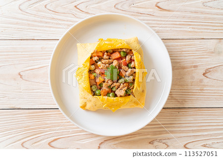 egg wrap or stuffed egg with minced pork and vegetable egg wrap or stuffed egg with minced pork and vegetable 113527051