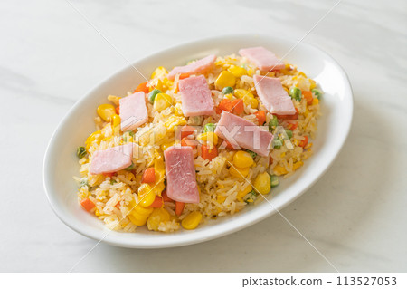 fried rice with ham and mixed vegetable (carrot, green bean peas, carrot) fried rice with ham and mixed vegetable (carrot, green bean peas, carrot) 113527053