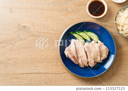 Hainanese chicken rice or rice steamed with chicken soup 113527125