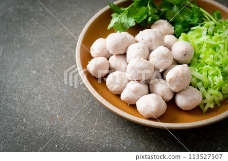 pork meatball with vegetable and spicy sauce 113527507