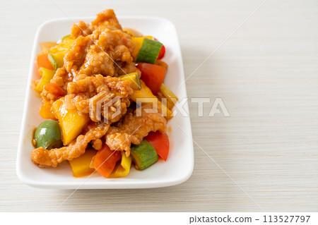 Stir fried sweet and sour sauce with pork 113527797
