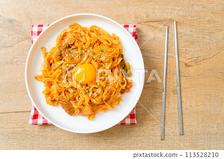 stir-fried udon noodles with kimchi and pork stir-fried udon noodles with kimchi and pork 113528210