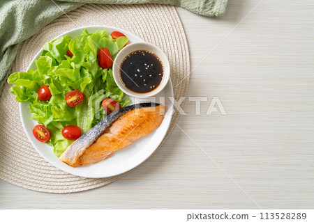 grilled salmon fillet steak with salad grilled salmon fillet steak with salad 113528289