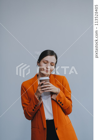 Business woman portrait with cup , isolated. Female model with long hair. Business woman portrait with cup , isolated. Female model with long hair. 113528405