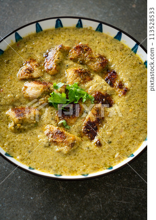 Afghani chicken in green curry or Hariyali tikka chicken hara masala Afghani chicken in green curry or Hariyali tikka chicken hara masala 113528533