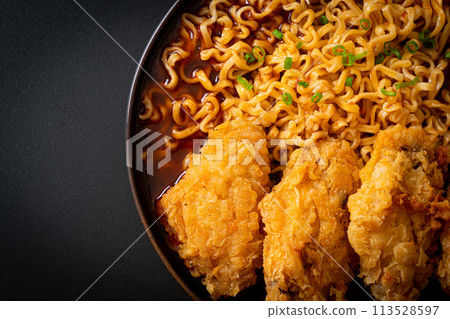 Korean instant noodles with fried chicken or Fried chicken ramyeon Korean instant noodles with fried chicken or Fried chicken ramyeon 113528597