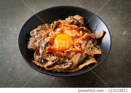 pork bulgogi rice bowl with kimchi and Korean pickled egg 113528621