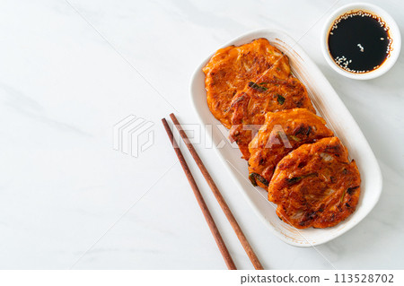 Korean Kimchi pancake or Kimchijeon - Fried Mixed Egg, Kimchi, and Flour Korean Kimchi pancake or Kimchijeon - Fried Mixed Egg, Kimchi, and Flour 113528702