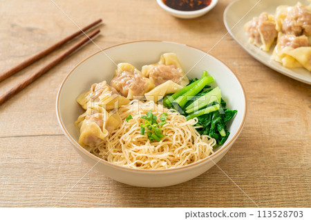 dried egg noodles with pork wonton or pork dumplings without soup 113528703