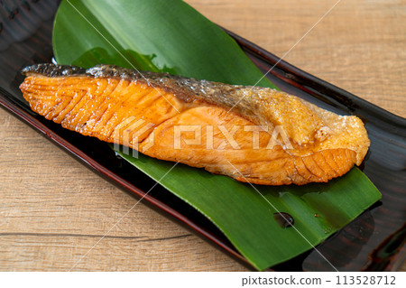 Grilled Salmon Steak with Soy Sauce 113528712