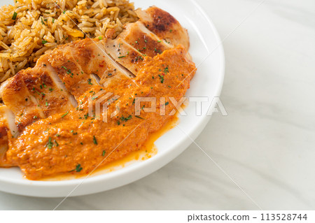 grilled chicken steak with red curry sauce and rice grilled chicken steak with red curry sauce and rice 113528744