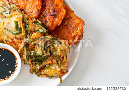 Pajeon or Korean pancake and Korean Kimchi pancake or Kimchijeon on white background 113528780