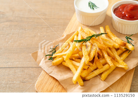 French fries with sour cream and ketchup French fries with sour cream and ketchup 113529150
