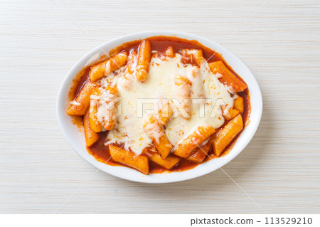 Korean rice cake in spicy Korean sauce with cheese, Cheese Tokpokki, Tteokbokki with Cheese Korean rice cake in spicy Korean sauce with cheese, Cheese Tokpokki, Tteokbokki with Cheese 113529210