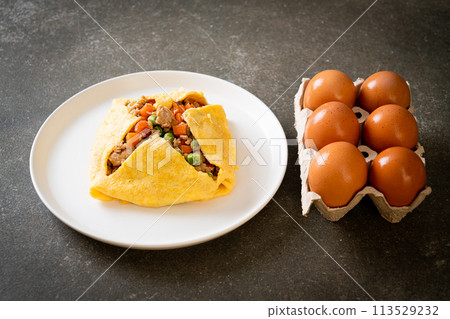 egg wrap or stuffed egg with minced pork and vegetable 113529232
