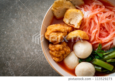 small flat rice noodles with fish balls and shrimp balls in pink soup, Yen Ta Four or Yen Ta Fo small flat rice noodles with fish balls and shrimp balls in pink soup, Yen Ta Four or Yen Ta Fo 113529273