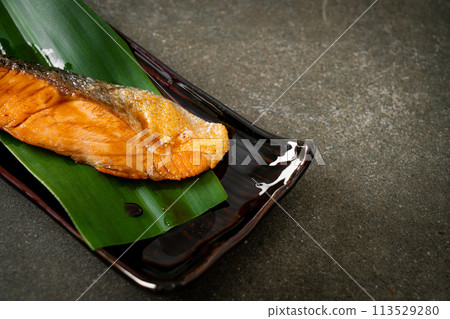 Grilled Salmon Steak with Soy Sauce 113529280
