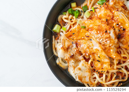 ramen noodles with gyoza or pork dumplings ramen noodles with gyoza or pork dumplings 113529294