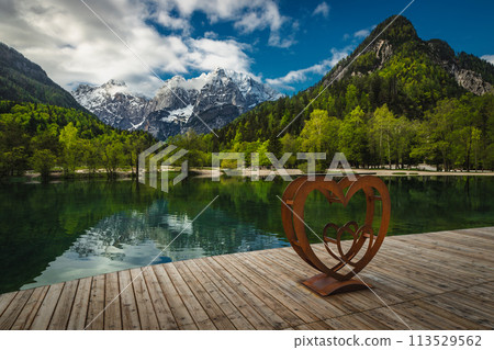 Symbol of the love on the wooden pier, Lake Jasna Symbol of the love on the wooden pier, Lake Jasna 113529562