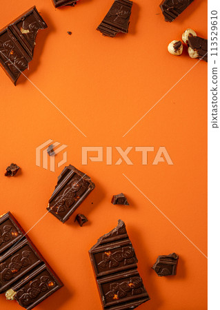 Chocolate bar pieces. Background with chocolate. Sweet food photo concept. Chocolate bar pieces. Background with chocolate. Sweet food photo concept. 113529610