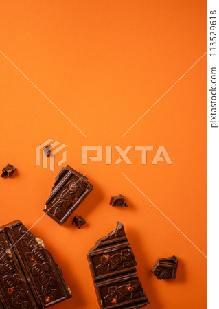 Chocolate bar pieces. Background with chocolate. Sweet food photo concept. Chocolate bar pieces. Background with chocolate. Sweet food photo concept. 113529618