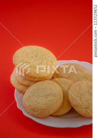 Delicious sugar cookies on wooden table, closeup Delicious sugar cookies on wooden table, closeup 113529652