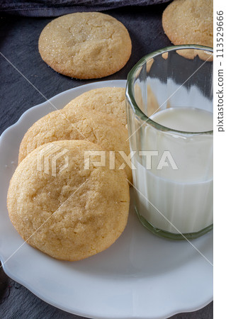 Delicious sugar cookies on wooden table, closeup Delicious sugar cookies on wooden table, closeup 113529666