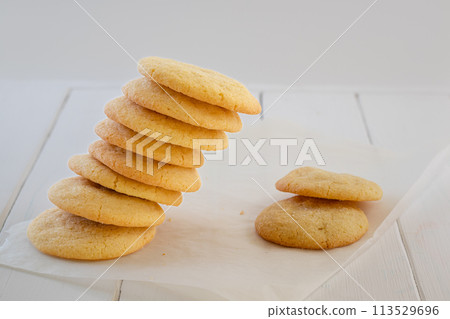 Delicious sugar cookies on wooden table, closeup Delicious sugar cookies on wooden table, closeup 113529696