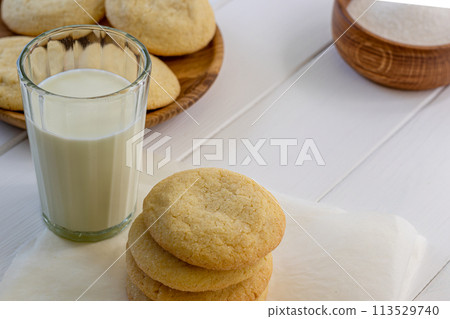 Delicious sugar cookies on wooden table, closeup 113529740