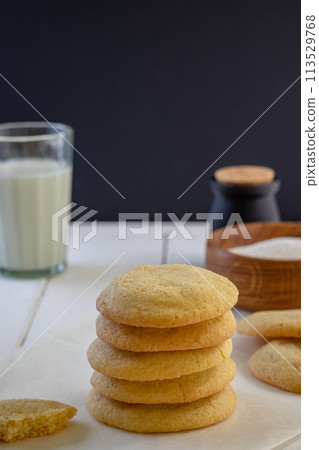 Delicious sugar cookies on wooden table, closeup Delicious sugar cookies on wooden table, closeup 113529768