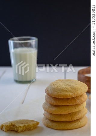 Delicious sugar cookies on wooden table, closeup Delicious sugar cookies on wooden table, closeup 113529812
