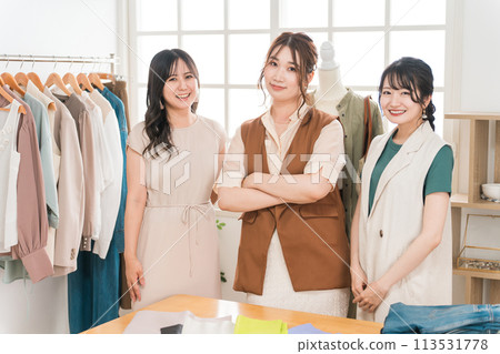 Women working in textile designers, fashion designers, pattern makers, stylists, and apparel. Women working in textile designers, fashion designers, pattern makers, stylists, and apparel. 113531778