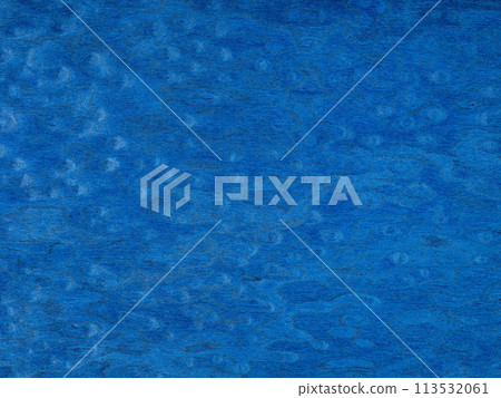 A vibrant sapphire journey across this elm burl veneer, where indigo meets navy in a serene woodland dance 113532061