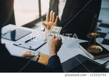 Businessman and Male lawyer or judge consult having team meeting with client, Law and Legal services concept. Businessman and Male lawyer or judge consult having team meeting with client, Law and Legal services concept. 113532741