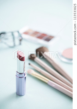 Eyeshadow palette, eyelash curler, makeup brush, lipstick and blush Eyeshadow palette, eyelash curler, makeup brush, lipstick and blush 113533825